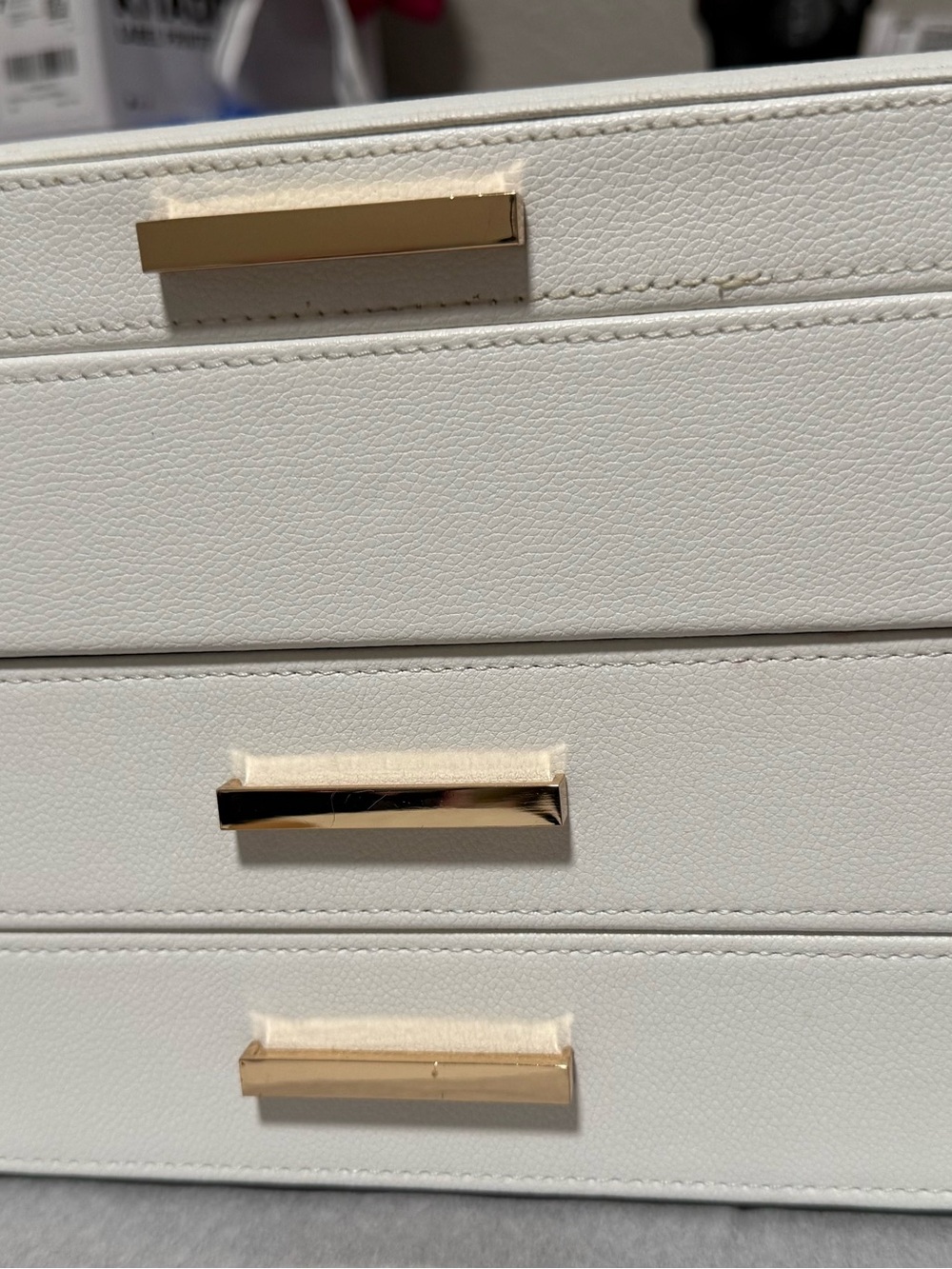 cupcakes & cashmere White Cosmetic Case with Gold Accents